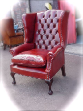 The High Back Georgian Leather Wing Chair in Leather with Straight Legs