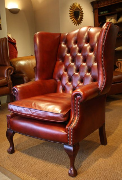 The High Back Georgian Leather Wing Chair with Claw & Ball Legs
