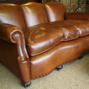 Edwardian Hump Backed Leather Sofa